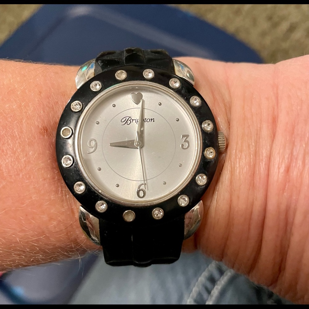 Pretty Brighton black watch with rhinestones around the white face.